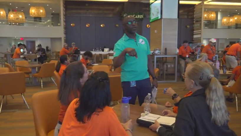 Miami Dade College professor finds his passion with side job at Hard Rock Stadium — CBS Miami, Lake Mary Arts news