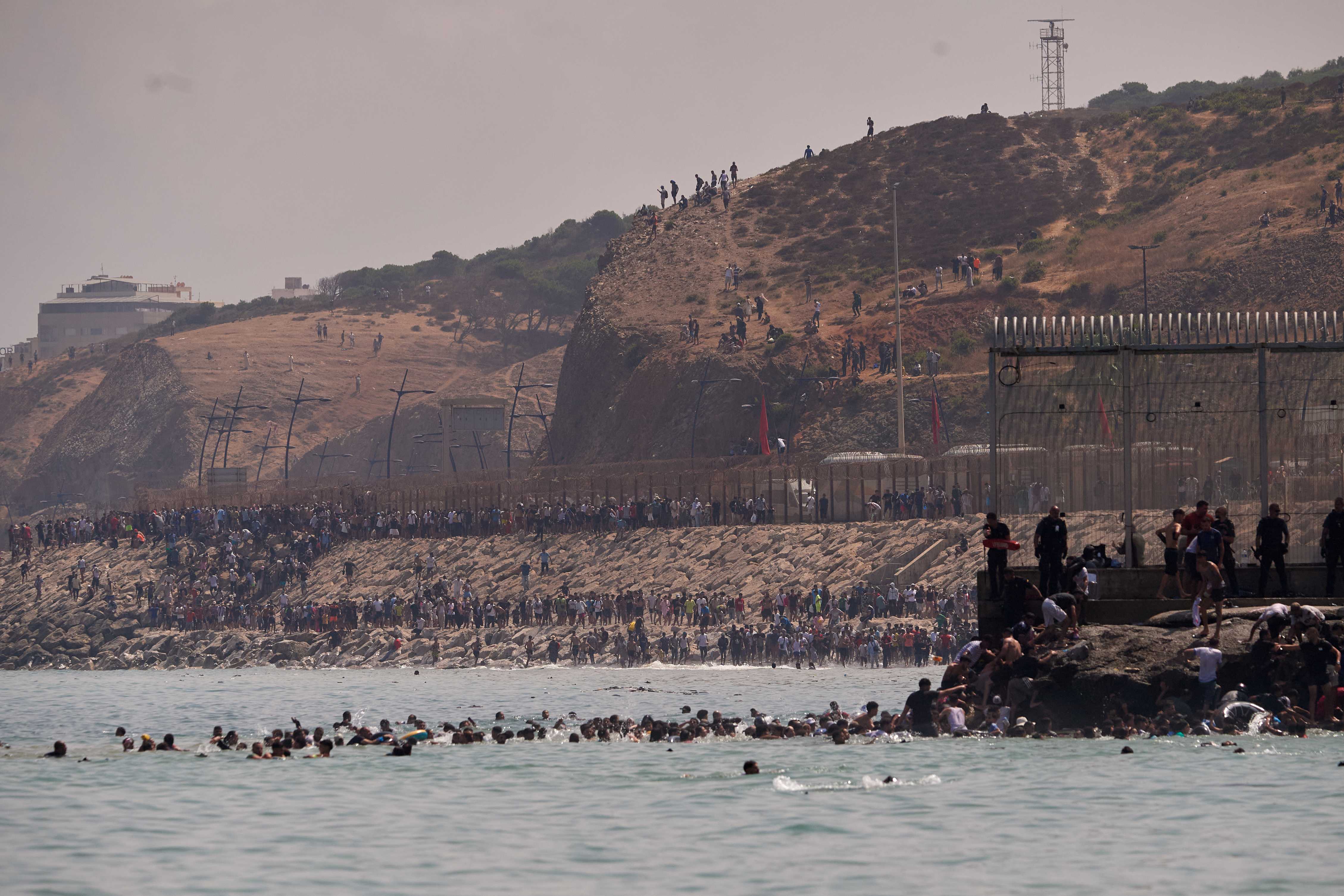 60,000 cross into Spanish territory of Ceuta and at least 34 die after border breach — WESH 2 Orlando